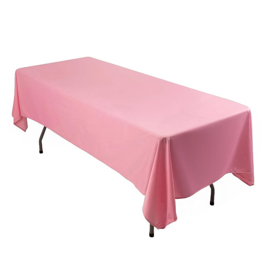 Pink table cover draped over a rectangular table