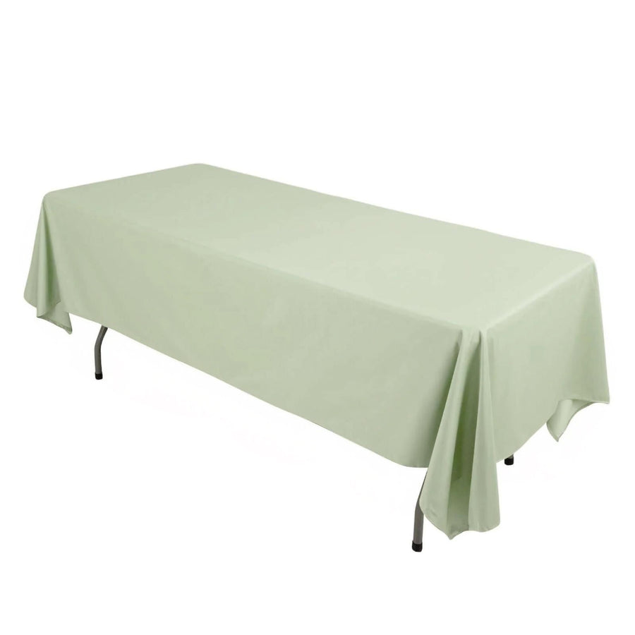 Light green tablecloth on a rectangular table