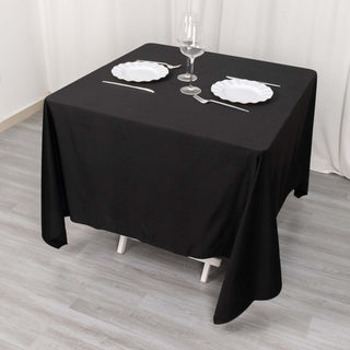 Upgrade Your Table Game with the 70" Black Premium Scuba Wrinkle Free Square Tablecloth Upgrade Your Table Game with the 70" Black Premium Scuba Wrinkle Free Square Tablecloth
