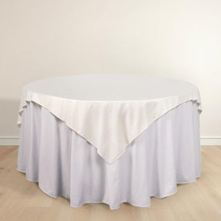 Elevate Your Event with the Ivory Premium Scuba Wrinkle Free Square Table Overlay Elevate Your Event with the Ivory Premium Scuba Wrinkle Free Square Table Overlay