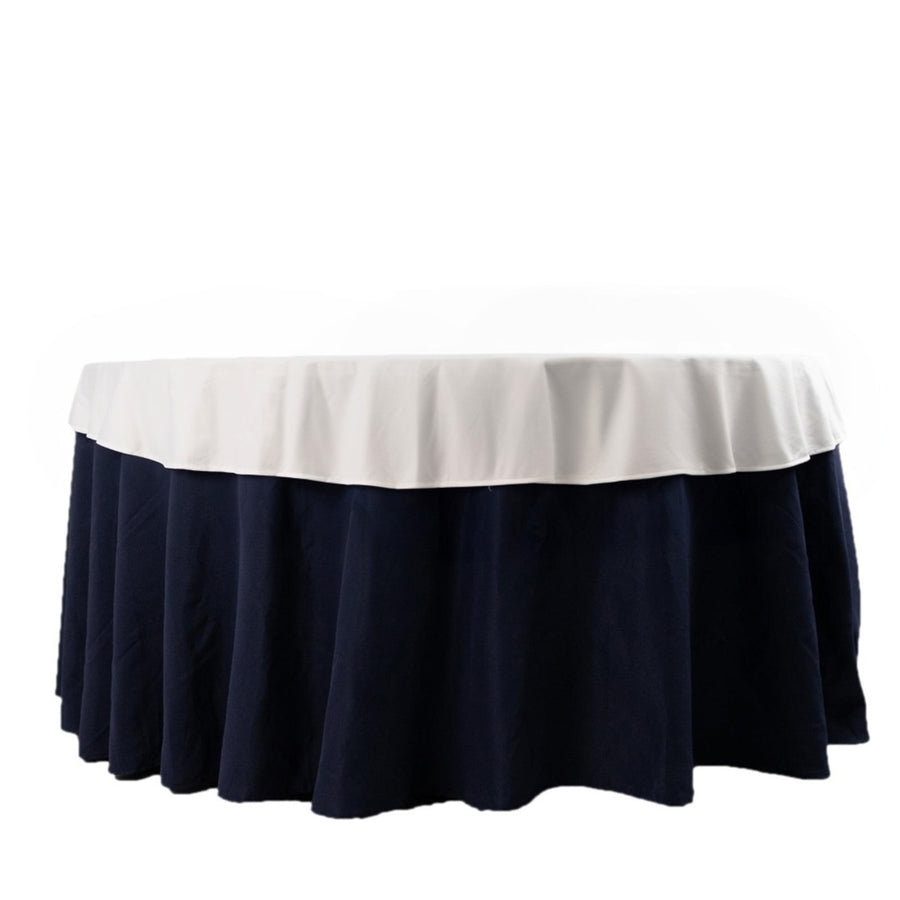 Navy blue tablecloth with white trim, suitable for events or dining.