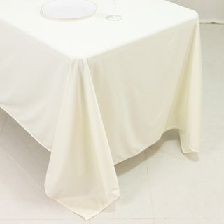 Cream tablecloth draped elegantly over a table.