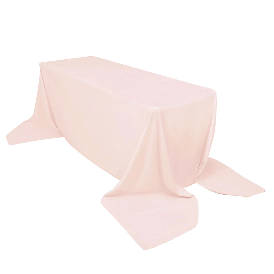 Pink tablecloth draped elegantly over a rectangular table
