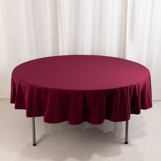 <strong>90" Round Burgundy Scuba Tablecloth</strong> <strong>90" Round Burgundy Scuba Tablecloth</strong>