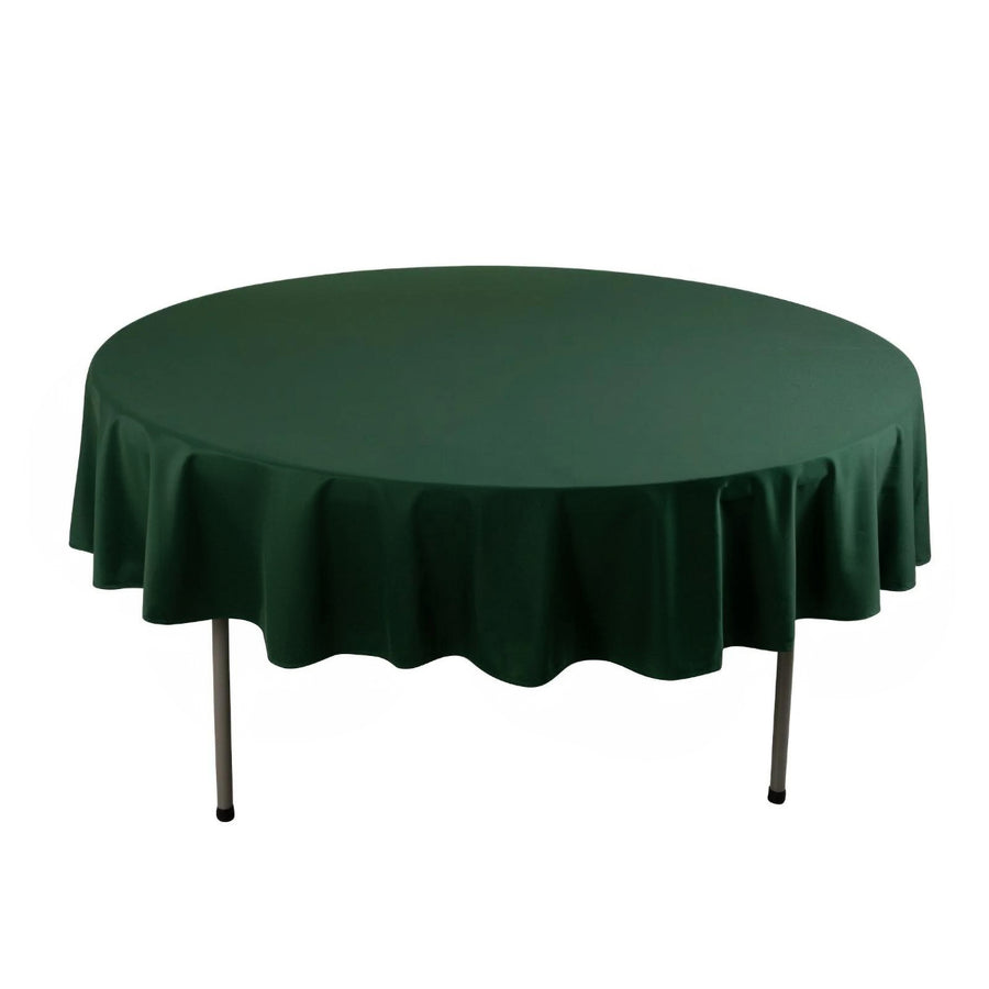 Green round tablecloth with scalloped edges