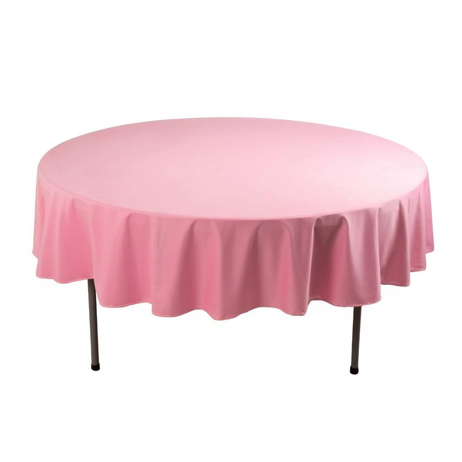 Pink round tablecloth draped elegantly over a table