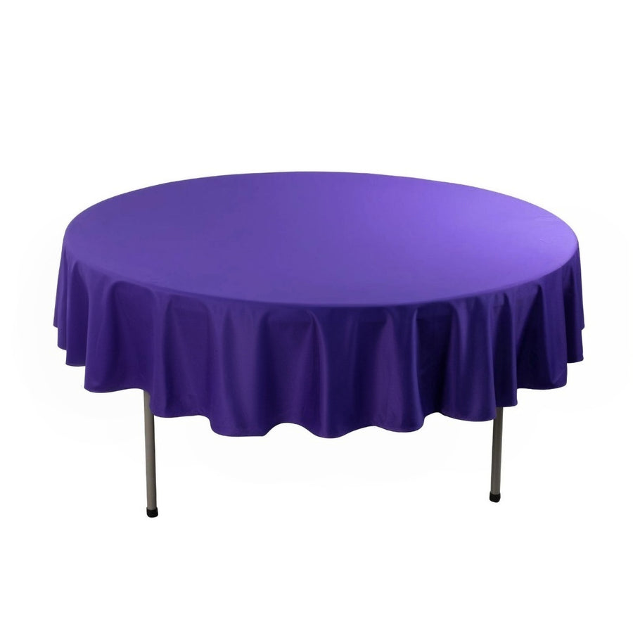 Purple round tablecloth on a white backdrop