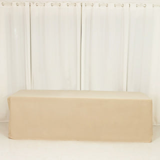 Beige table cover on a white backdrop