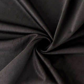 Black fabric texture in a swirling pattern. #whtbkgd