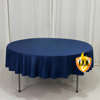 Round navy blue tablecloth on a table
