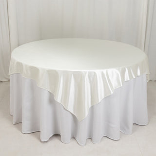 Shimmering Scuba 70"x70" Table Overlay in Pearl White Shimmering Scuba 70"x70" Table Overlay in Pearl White