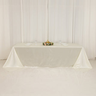 Seamless Scuba Rectangular 90"x156" Tablecloth in Shimmering Pearl White Seamless Scuba Rectangular 90"x156" Tablecloth in Shimmering Pearl White