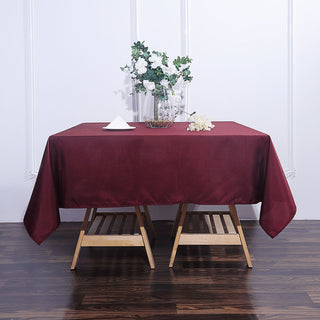 Add Elegance to Your Event with a Burgundy Square Polyester Tablecloth Add Elegance to Your Event with a Burgundy Square Polyester Tablecloth