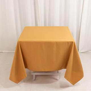 <strong>Elegant Gold Polyester Square Tablecloth</strong> <strong>Elegant Gold Polyester Square Tablecloth</strong>