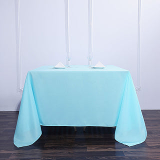 Add Elegance to Your Event with the 90"x90" Light Blue Square Polyester Tablecloth Add Elegance to Your Event with the 90"x90" Light Blue Square Polyester Tablecloth