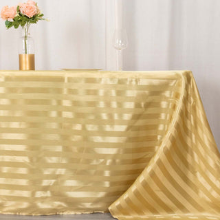 Elevate Your Event with the 90"x132" Champagne Satin Stripe Seamless Rectangular Tablecloth Elevate Your Event with the 90"x132" Champagne Satin Stripe Seamless Rectangular Tablecloth