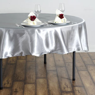 Create a Luxurious Atmosphere with the Silver Seamless Satin Round Tablecloth