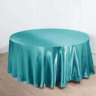 Elevate Your Event Decor with the 120" Turquoise Seamless Satin Round Tablecloth