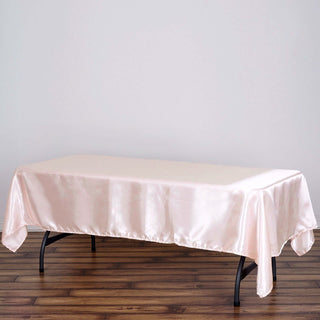 Dress Your Tables to the Nines with our Blush Satin Tablecloth Dress Your Tables to the Nines with our Blush Satin Tablecloth