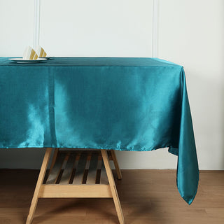 Enhance Your Event Decor with the Teal Seamless Satin Rectangular Tablecloth