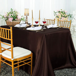 Elevate Your Event Decor with the 90x132 Chocolate Satin Seamless Rectangular Tablecloth