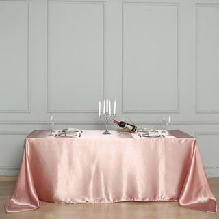Add Elegance to Your Event with the Dusty Rose Seamless Satin Rectangular Tablecloth