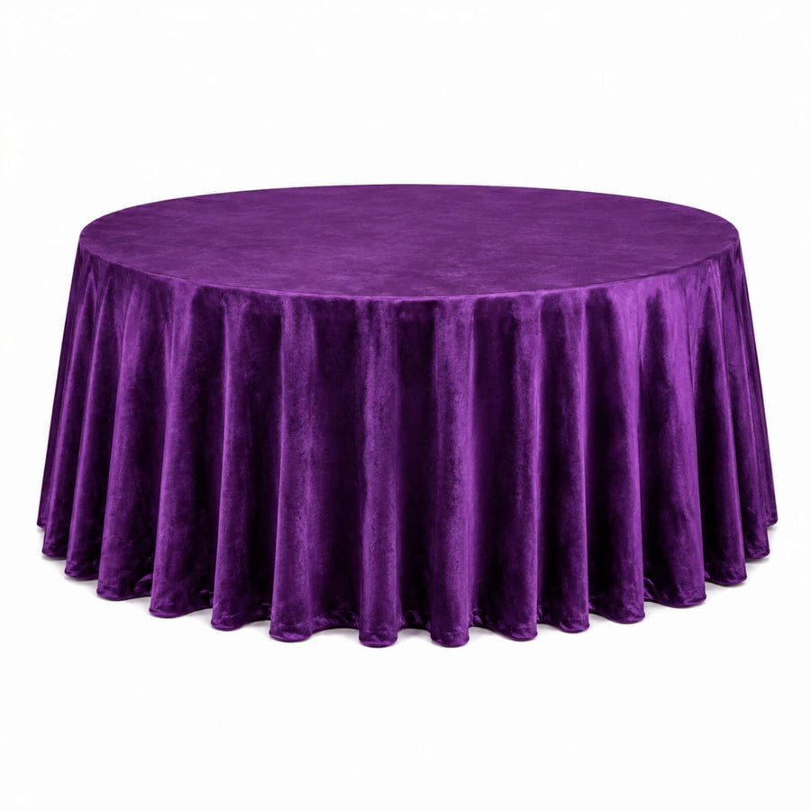 Purple velvet round tablecloth draped over a banquet table