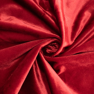 Red satin fabric swirl with glossy texture and dramatic folds#whtbkgd