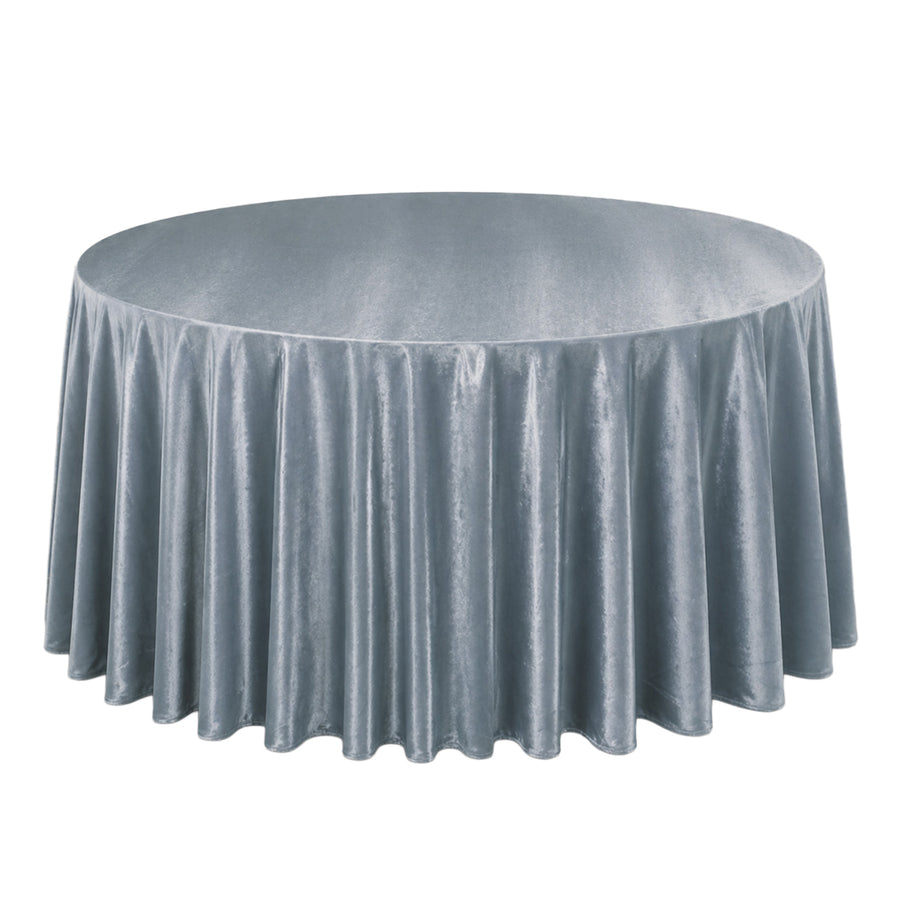 Round table with silver gray satin tablecloth and floor-length drape