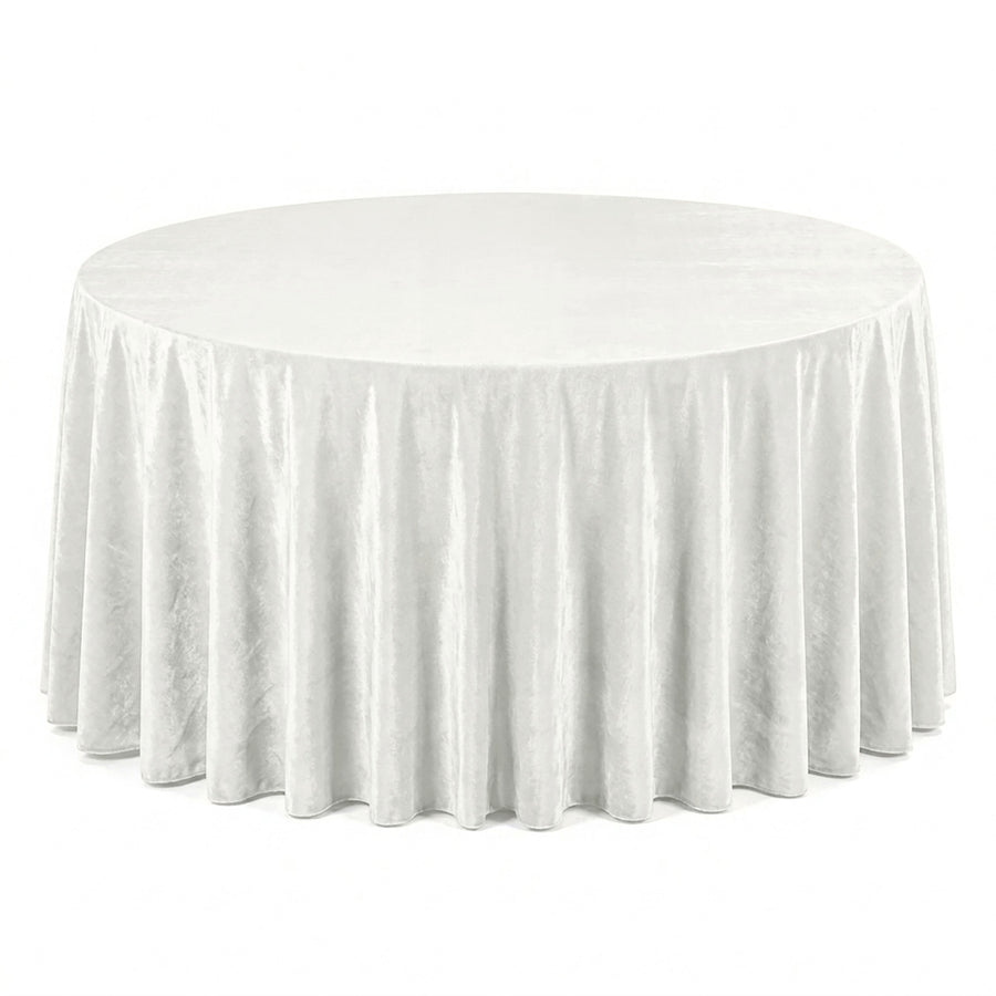 White round table with elegant floor-length tablecloth