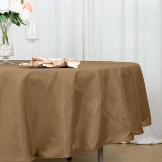 Create an Upscale Atmosphere with the 90" Taupe Polyester Round Tablecloth Create an Upscale Atmosphere with the 90" Taupe Polyester Round Tablecloth