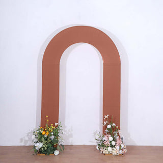 Elevate Your Event with the Terracotta (Rust) Spandex Fitted Arch Cover Elevate Your Event with the Terracotta (Rust) Spandex Fitted Arch Cover