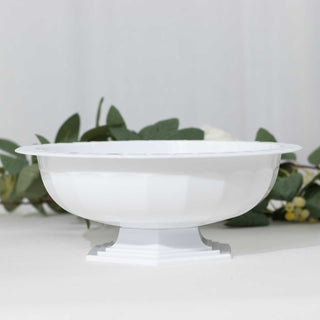 White decorative bowl on a pedestal with a smooth finish.
