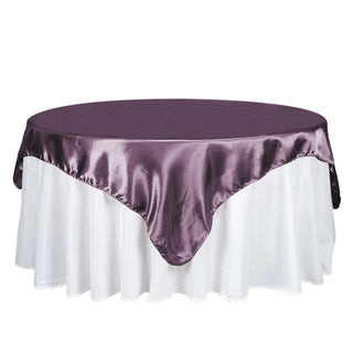 Add Elegance to Your Event with the 72"x72" Violet Amethyst Seamless Satin Square Tablecloth Overlay