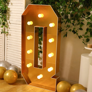 Large gold marquee letter "Q" with lights, perfect for events and celebrations.