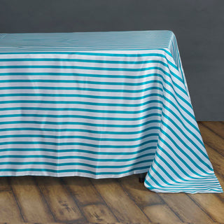 The Perfect Addition to Your Event Decor Collection: 60x126 White/Turquoise Seamless Stripe Satin Rectangle Tablecloth
