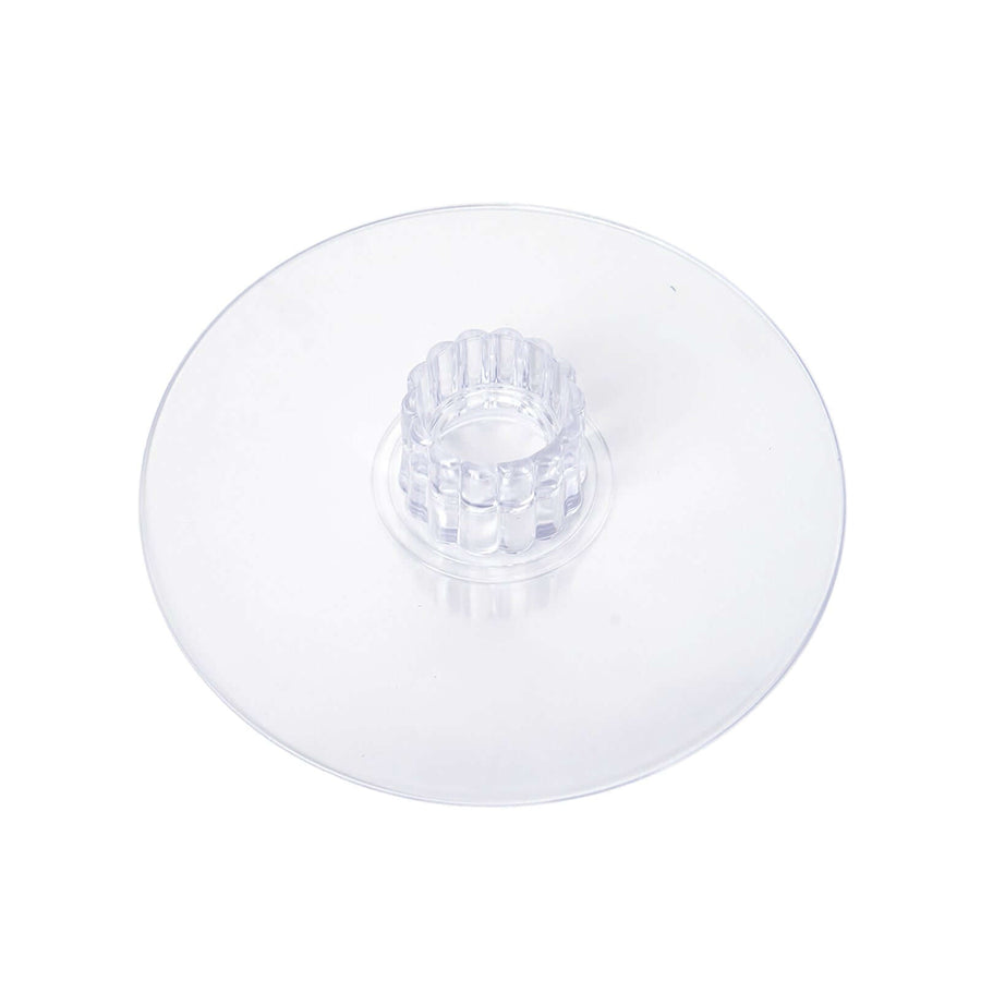 Clear round cake stand with raised center.