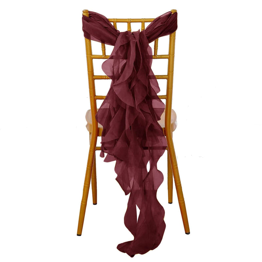 Burgundy chiffon chair sash draped elegantly on a gold chiavari chair