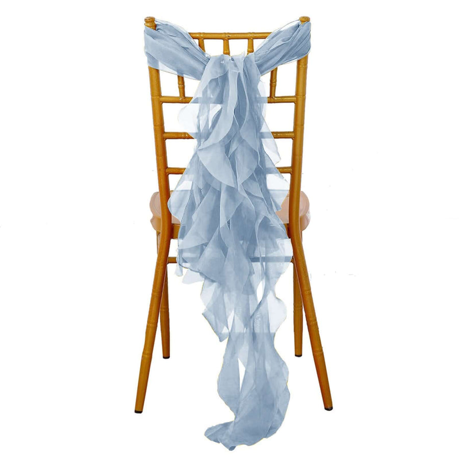 Light blue chiffon chair sash elegantly draped over a golden Chiavari chair