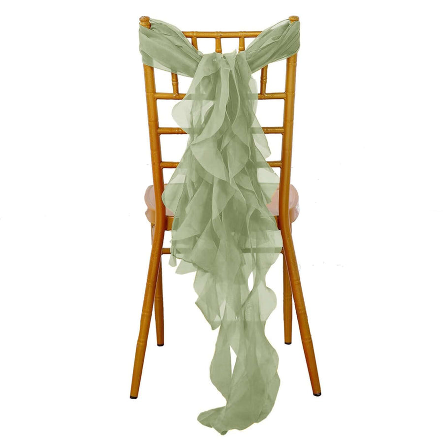 Green ruffled chair sash draped over a wooden chair