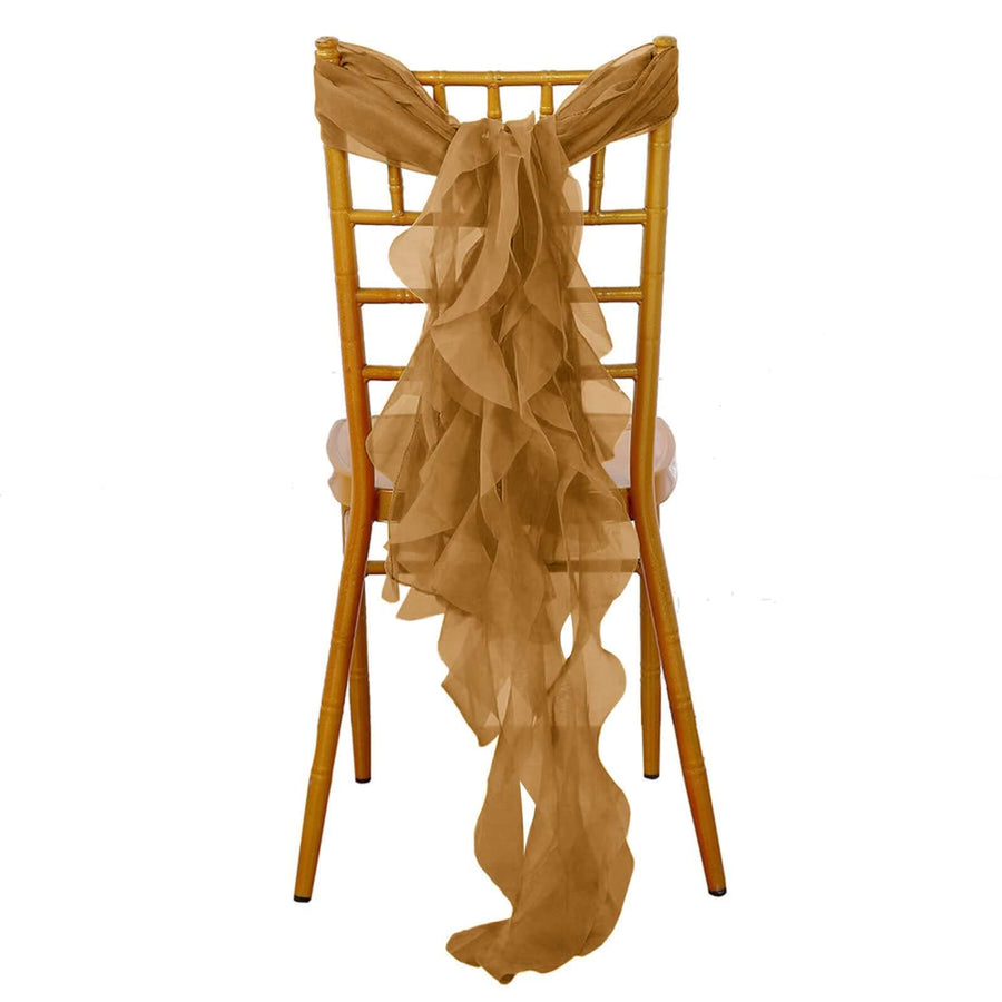 Tan chiffon chair sash draped elegantly over a gold chiavari chair.