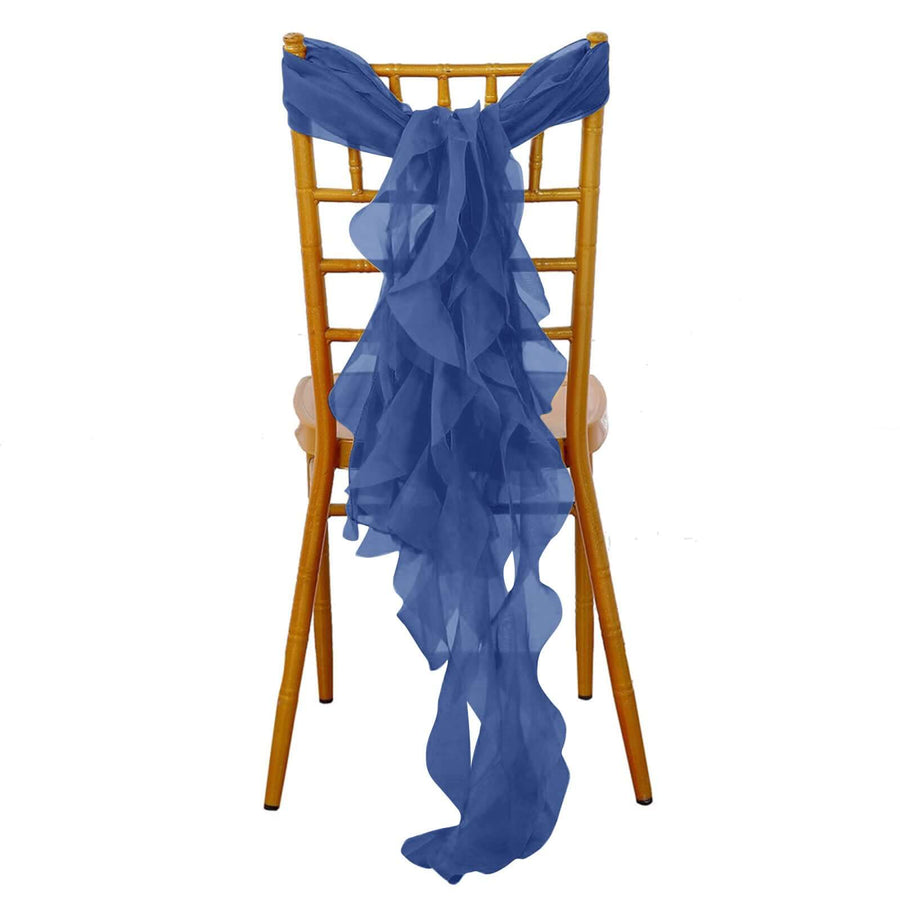 Blue chiffon chair sash tied in a bow on a gold chiavari chair.