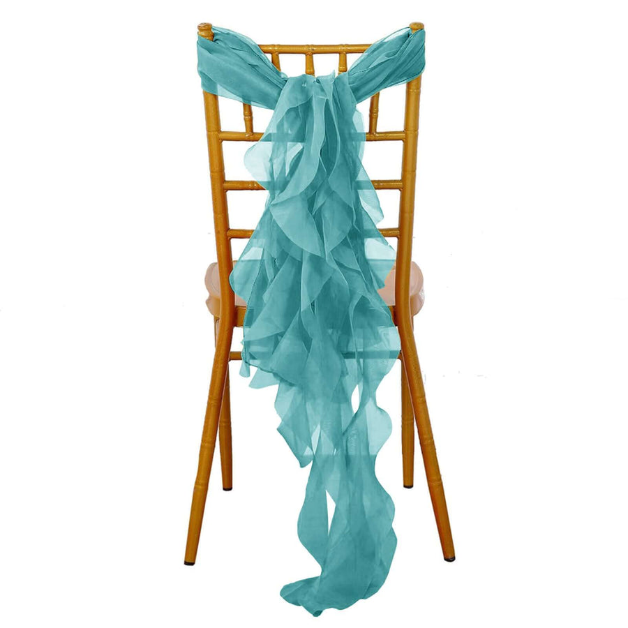 Turquoise chiffon chair sash draped elegantly on a gold chiavari chair