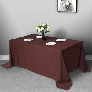 Add Elegance to Your Event with the 90x132 Chocolate Seamless Polyester Rectangular Tablecloth