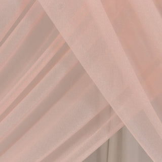 Sheer pink fabric draped elegantly, showcasing delicate texture. #whtbkgd