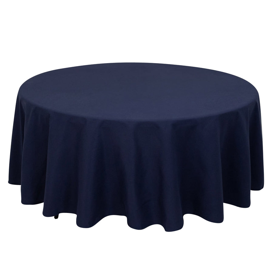 Round navy blue tablecloth on a white background.