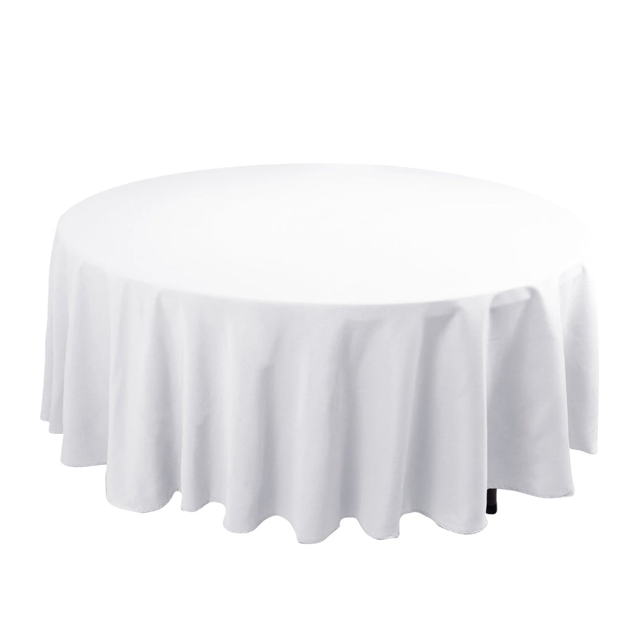Round white tablecloth on a plain background.
