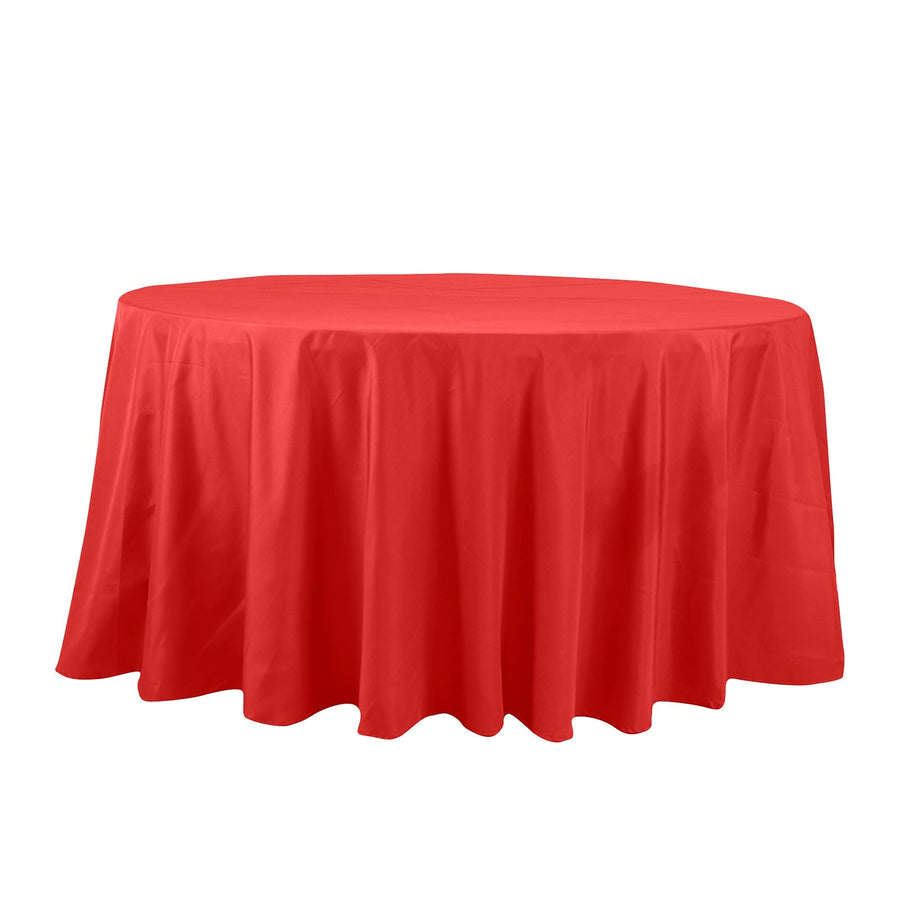 Red round tablecloth on a plain background