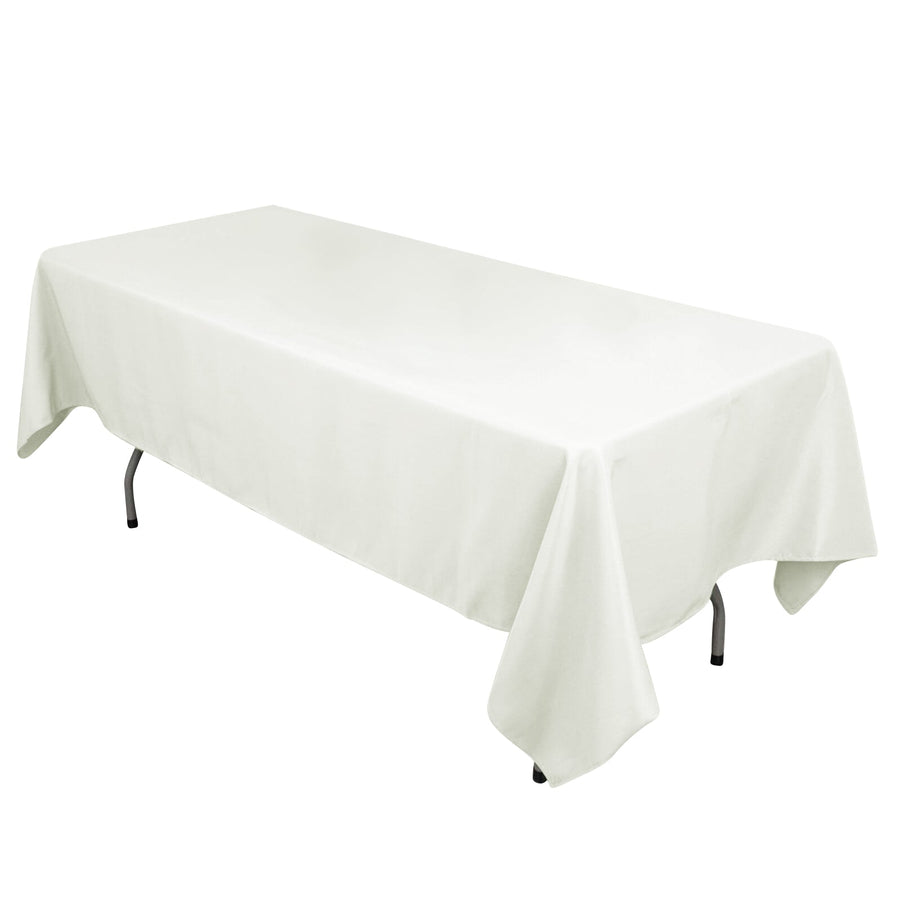 White rectangular table with a clean tablecloth