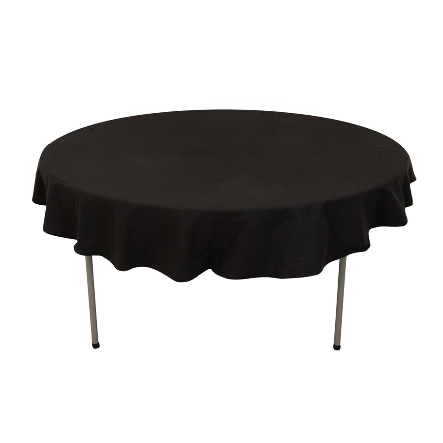 Black round tablecloth with scalloped edges on a white background